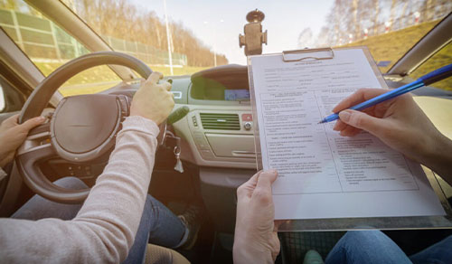 How to take a driving test at the DMV?